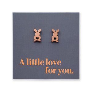 Bunny-shaped earrings on a card with 'A little love for you' text.