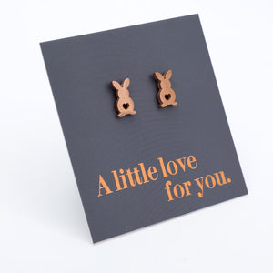Bunny-shaped earrings on a card with 'A little love for you' text