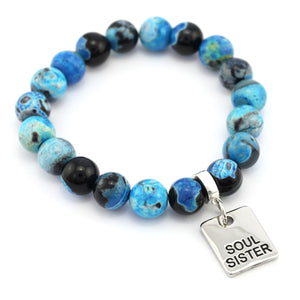 Blue and black beaded bracelet with a 'Soul Sister' tag on a white background