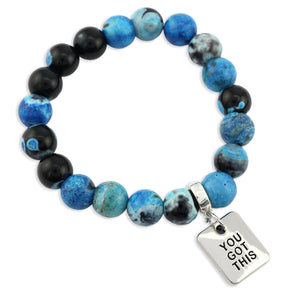 Blue and black beaded bracelet with a 'You Got This' charm on a white background
