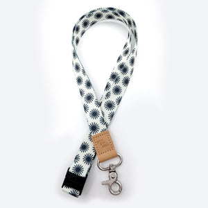 Lanyard with black star pattern on white background