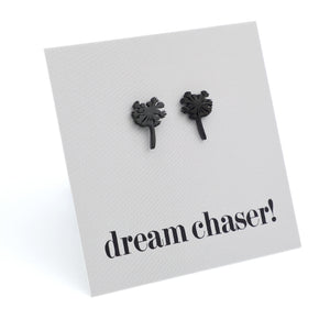 Black dandelion seed earrings on a 'dream chaser!' card