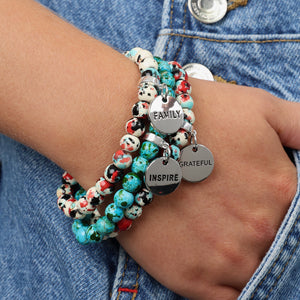 Stone Bracelet - Rebel Splash Speckled Howlite 8mm Beads - With Silver Word charm