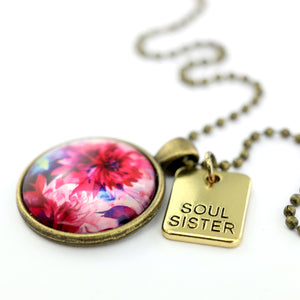 Pink floral print vintage gold circle pendant necklace with 'soul sister' charm. A product that fundraises for the National Breast Cancer Foundation.