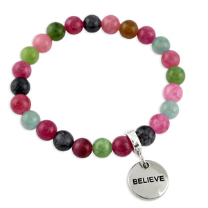 Multicolored beaded bracelet with a silver 'BELIEVE' charm on a white background