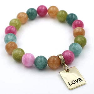 Multicolored beaded bracelet with a gold 'LOVE' tag on a white background