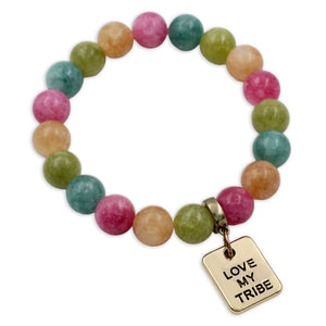 Multicolored beaded bracelet with 'Love My Tribe' charm on a white background