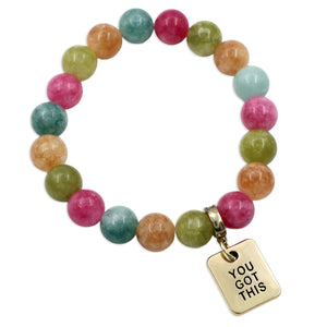 Multicolored beaded bracelet with a gold 'YOU GOT THIS' charm on a white background