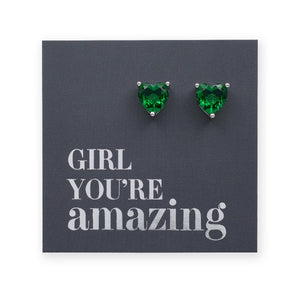 Green heart-shaped earrings on a card with 'Girl You're Amazing' text