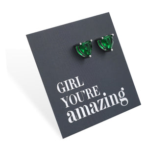 Green heart-shaped earrings on a card with 'Girl You're Amazing' text
