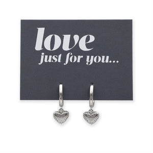 Silver shell-shaped earrings on a card with 'love just for you' text.