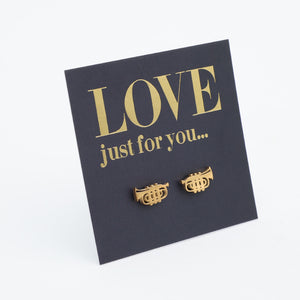 Gold trumpet earrings on a black card with 'LOVE just for you...' text.