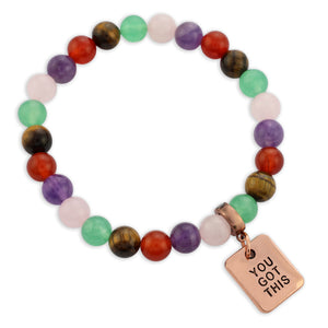 Multicolored beaded bracelet with a rose gold charm reading 'You Got This' on a white background