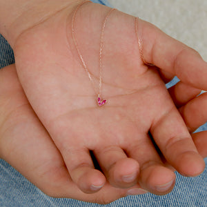Pink heart pendant necklace sterling silver with 18K rose gold plating on gift card that has text that says so loved.