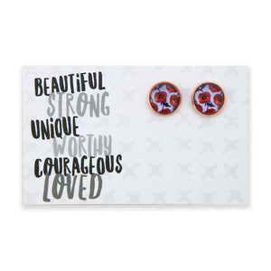 Pair of purple and red poppy earrings on a card with motivational text on a white background