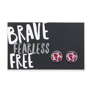 Pair of floral earrings on a card with 'Brave Fearless Free' text