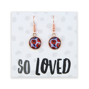 Earrings on a card with 'So Loved' text
