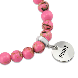 Pink beaded bracelet with a silver 'FIGHT' charm on a white background