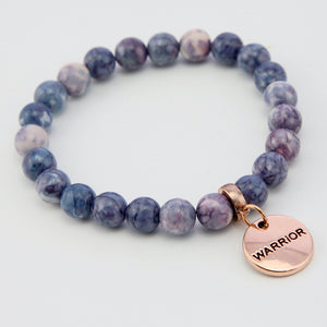 purple and pink bracelet with rose gold warrior charm