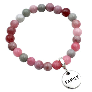 Bracelet with pink and gray beads and a 'FAMILY' charm on a white background