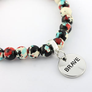 Stone Bracelet - Rebel Splash Speckled Howlite 8mm Beads - With Silver Word charm