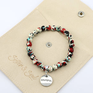 Stone Bracelet - Rebel Splash Speckled Howlite 8mm Beads - With Silver Word charm