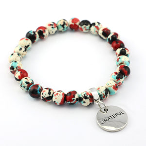 Stone Bracelet - Rebel Splash Speckled Howlite 8mm Beads - With Silver Word charm