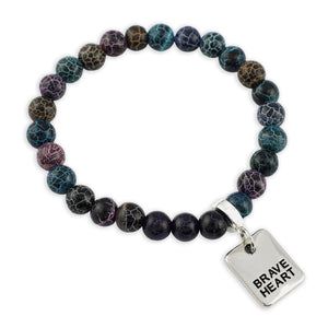 Bracelet with marbled beads and 'Brave Heart' charm on a white background