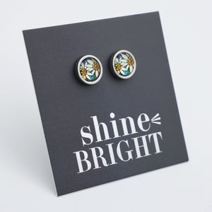 Floral earrings on a 'shine BRIGHT' card