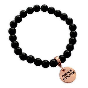 Black beaded bracelet with a rose gold 'Friends Forever' charm on a white background