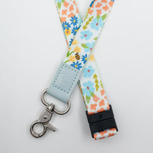 You Got This embossed on a colourful floral lanyard with pale blue trim and a lobster clasp.