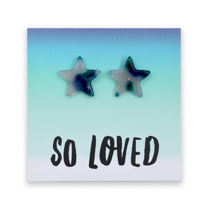 Two star-shaped stud earrings with a marbled blue, green, and white resin finish, displayed on a square card with the text 'SO LOVED' against a white background.