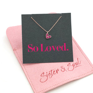 Pink heart pendant necklace sterling silver with 18K rose gold plating on gift card that has text that says so loved.