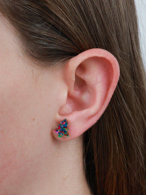 Wishing You Joy Christmas tree acrylic glitter stud earrings in kaleidoscope glitter worn on an ear to show size and fit