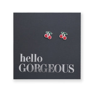 silver cherry earrings on a grey card with silver writing "Hello Gorgeous" on a white background