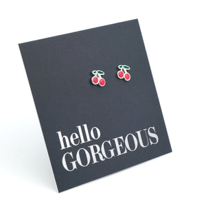 silver cherry earrings on a grey card with silver writing "Hello Gorgeous" on a white background