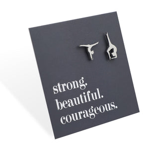 Gymnast earrings on a card with 'strong. beautiful. courageous.' text