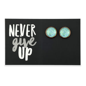 Teal print rose gold dangle earrings on love and inspiring word card on white background.