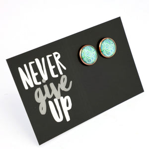 Teal print rose gold dangle earrings on love and inspiring word card on white background.