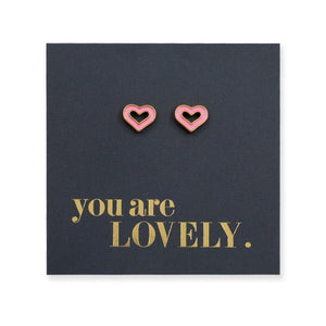 Heart-shaped earrings on a card with 'you are LOVELY.' text