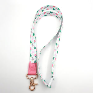 Full-length Christmas Delight lanyard with colourful Christmas trees, a pink Teach Love Inspire tab and gold-tone clasp.