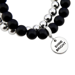 Stone Bead Bracelet Duo. Matt Black Onyx stone bead bracelet with silver clip and SHINE BRIGHT word charm with silver hematite stacker bracelet.