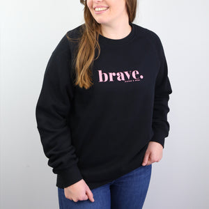Black Women's Crew Neck Jumper Loungewear with pink Brave Print. Corporate fundraiser for The National Breast Cancer Foundation.