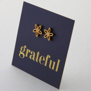 Stainless Steel Geo flower shape earrings. Hypoallergenic studs in Rose Gold, Silver, Black & Gold. Star shaped. Beautiful Gifts by Sister and Soul. Foil feature gift card Girl you are amazing.