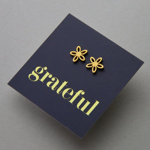 Stainless Steel Geo flower shape earrings. Hypoallergenic studs in Rose Gold, Silver, Black & Gold. Star shaped. Beautiful Gifts by Sister and Soul. Foil feature gift card Girl you are amazing.