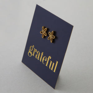 Stainless Steel Geo flower shape earrings. Hypoallergenic studs in Rose Gold, Silver, Black & Gold. Star shaped. Beautiful Gifts by Sister and Soul. Foil feature gift card Girl you are amazing.
