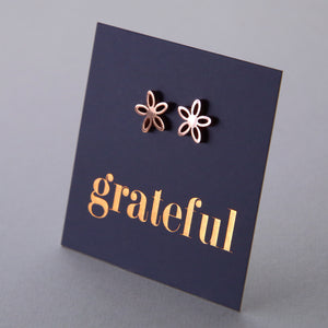 Stainless Steel Geo flower shape earrings. Hypoallergenic studs in Rose Gold, Silver, Black & Gold. Star shaped. Beautiful Gifts by Sister and Soul. Foil feature gift card Girl you are amazing.