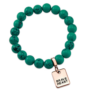 Teal coloured stone bracelet with word charm and rose gold clip.