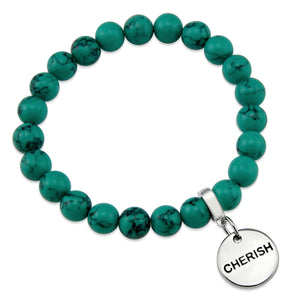 Teal coloured stone bead bracelet with silver meaningful word charm.