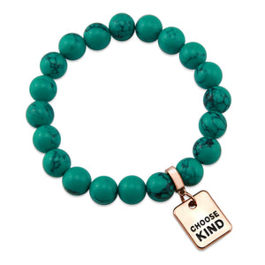 Teal coloured stone bracelet with word charm and rose gold clip.